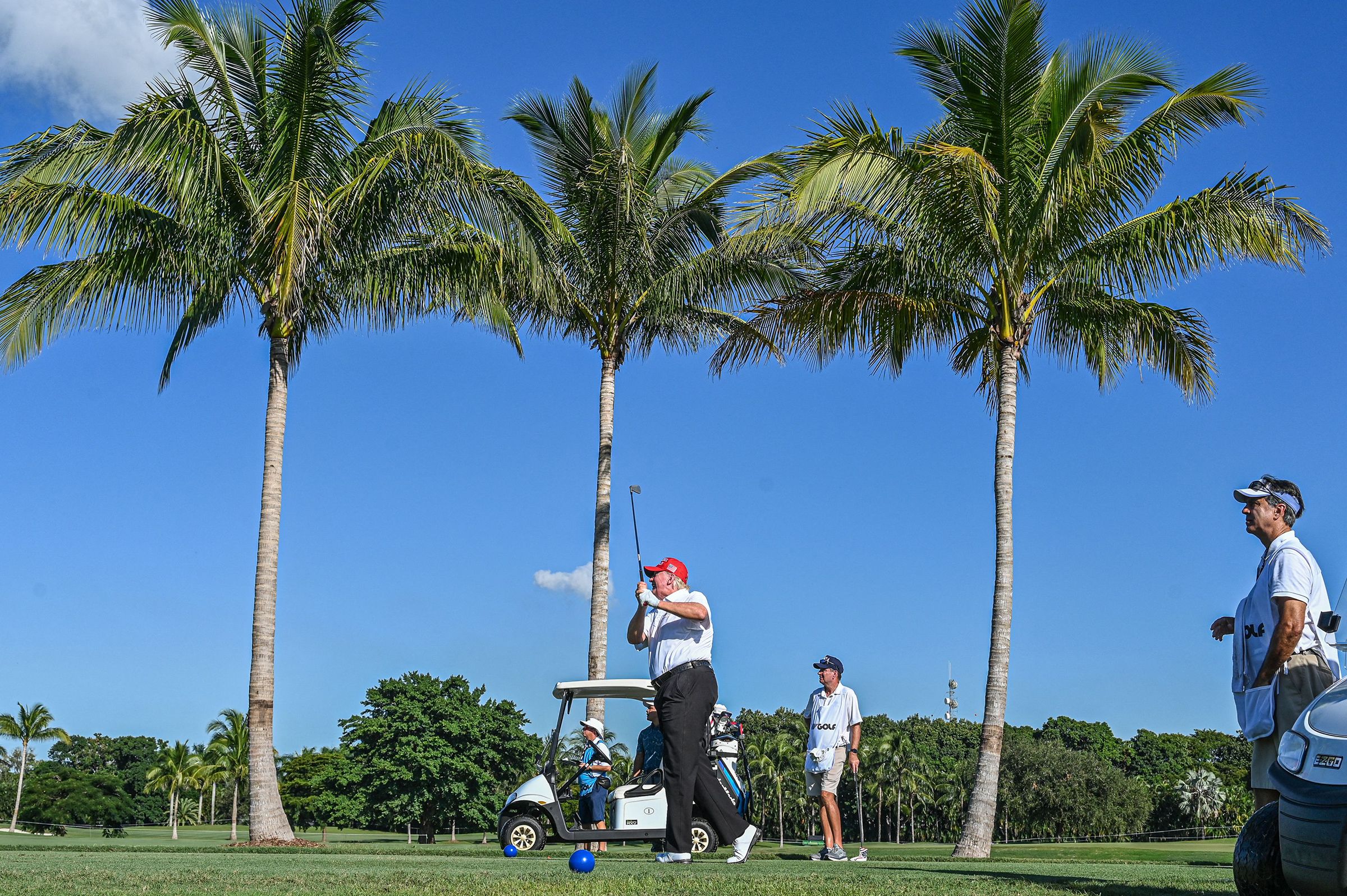 <i>Giorgio Viera/AFP/Getty Images via CNN Newsource</i><br/>This October 2022 photo shows Donald Trump playing golf at Trump National Doral Miami golf club on in Miami.