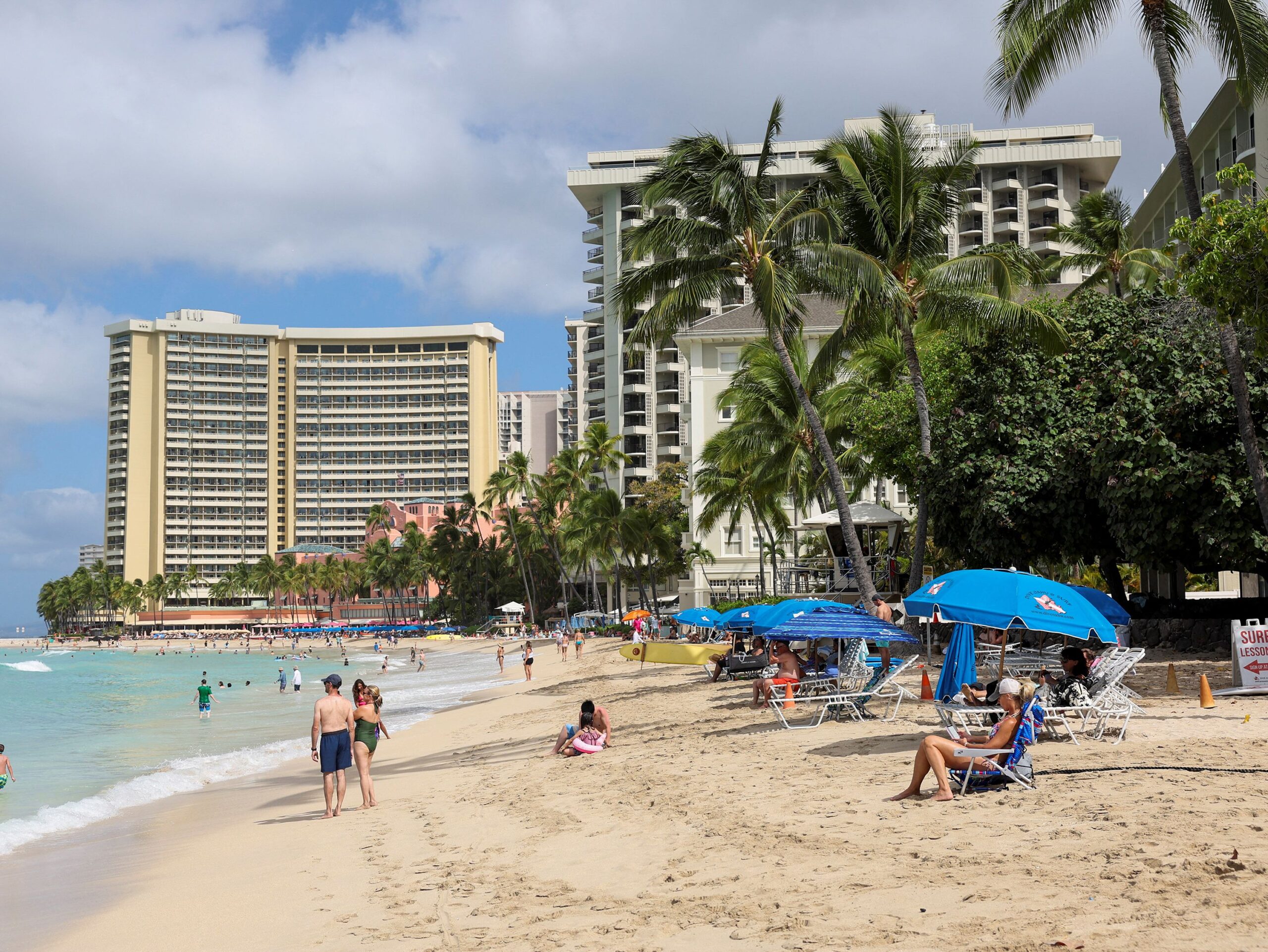 <i>Marco Garcia/Reuters via CNN Newsource</i><br/>Beachgoers gather in Waikiki after authorities downgraded earlier tsunami warnings following an earthquake off Russia’s Kamchatka Peninsula.