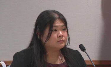 A woman who claims her adoptive parents kept her in a basement dungeon in New Boston shared her story in court Tuesday.