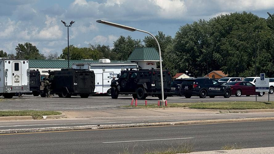 <i>KAKE News via CNN Newsource</i><br/>Police say the 47-year-old parolee who was wanted in connection to a fatal shooting at a Wichita hospital has died of self-inflicted gunshot wounds following an hours-long standoff in north Wichita on Tuesday afternoon.