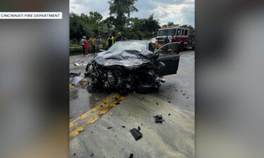Michael Askins said two bystanders pulled his son out of the car and quickly realized he wasn't breathing. He said that's when they began administering CPR.