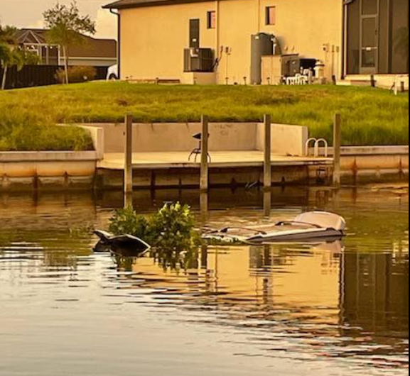 <i>WFTX/Cape Coral Fire Dept. via CNN Newsource</i><br/>A 29-year-old woman is facing multiple charges after her vehicle struck a utility pole and ended up in a canal in Cape Coral.