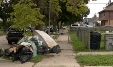 Milwaukee residents work to clean and recover one week after historic flooding devastated the area.
