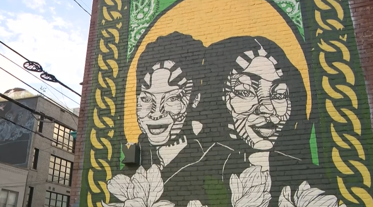 <i>WXIA via CNN Newsource</i><br/>The vigil for Amber Thurman and Candi Miller was held in front of the Free and Just mural on Edgewood Avenue in Atlanta