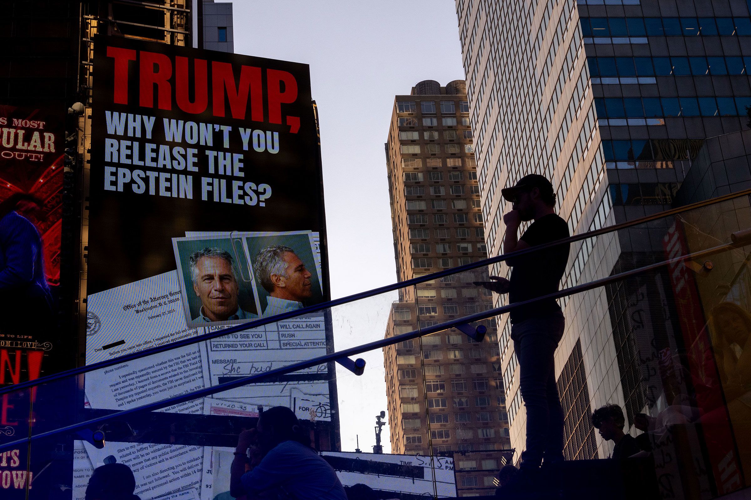 <i>Adam Gray/Getty Images/File via CNN Newsource</i><br/>A billboard in New York's Times Square calls for the release of the Epstein files on July 23.