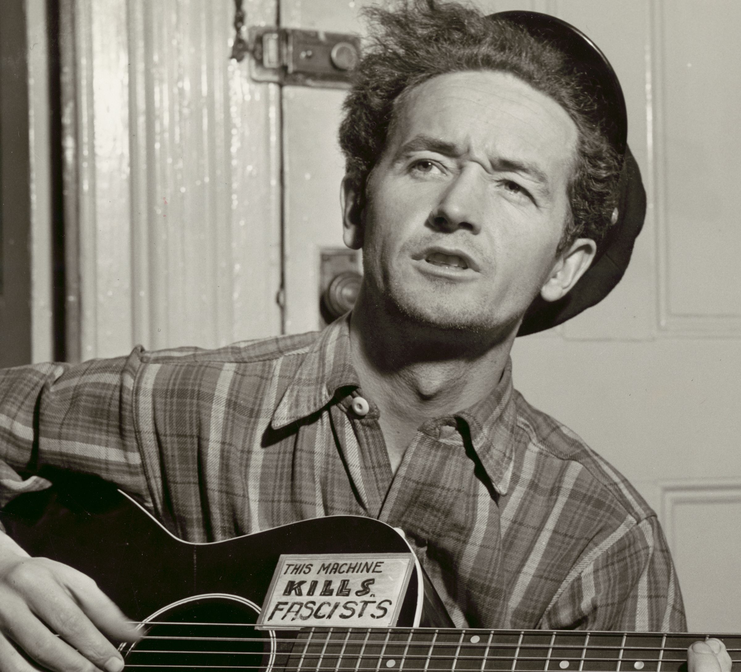 <i>Al Aumuller/New York World-Telegram and the Sun Newspaper Collection/Library of Congress via CNN Newsource</i><br/>Woody Guthrie in 1943