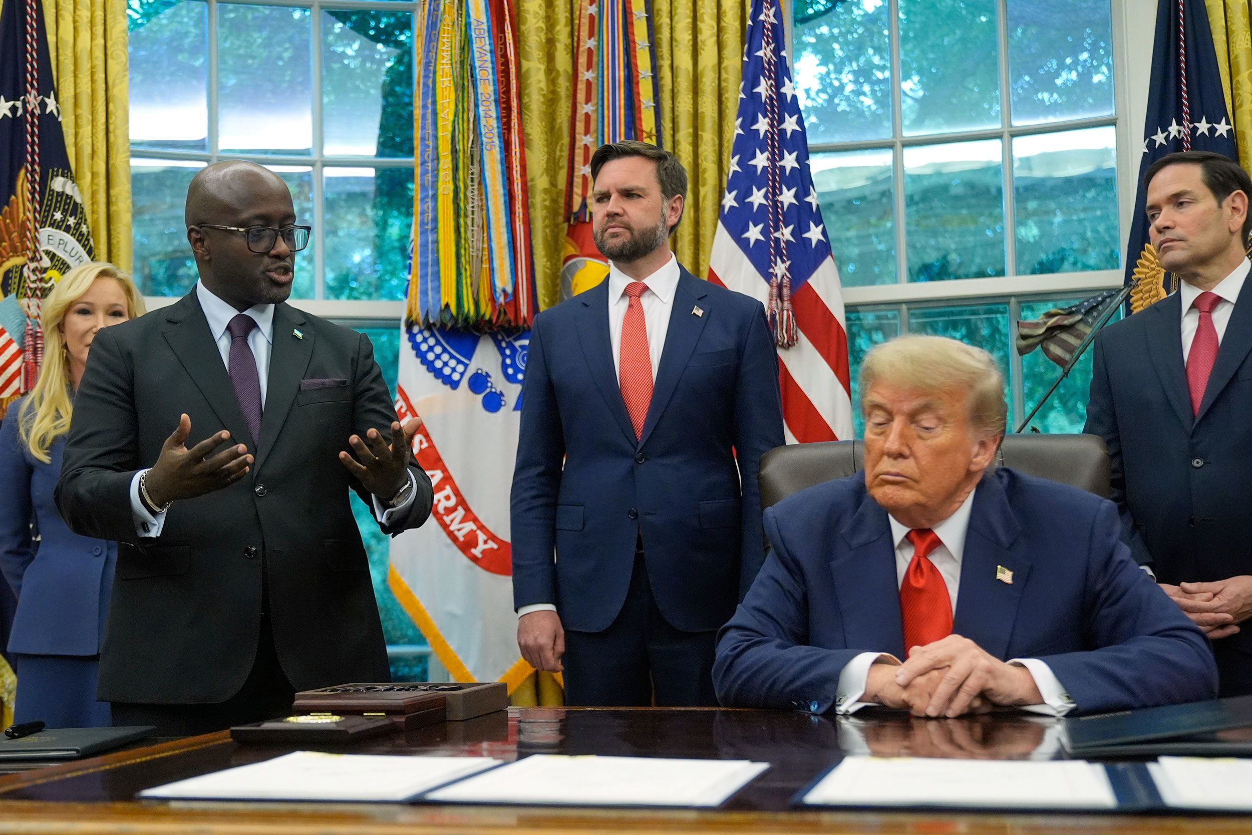 <i>Manuel Balce Ceneta/AP via CNN Newsource</i><br/>US President Donald Trump listens as Rwanda's foreign minister Olivier Nduhungirehe speaks during an event in the Oval Office at the White House in Washington