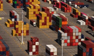 Shipping containers are stacked at the Port of Oakland in Oakland
