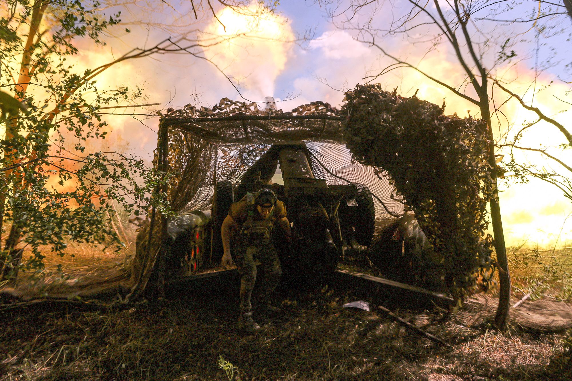 <i>Genya Savilov/AFP/Getty Images via CNN Newsource</i><br/>Ukrainian firefighters respond to a blaze after a Russian drone strike in the town of Bilozerske in Donetsk on August 10.