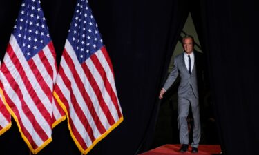 Robert F. Kennedy Jr. takes the stage during a campaign rally in Warren