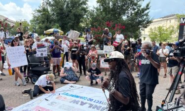 Demonstrators gather near police headquarters to protest Donald Trump’s federal takeover of Washington