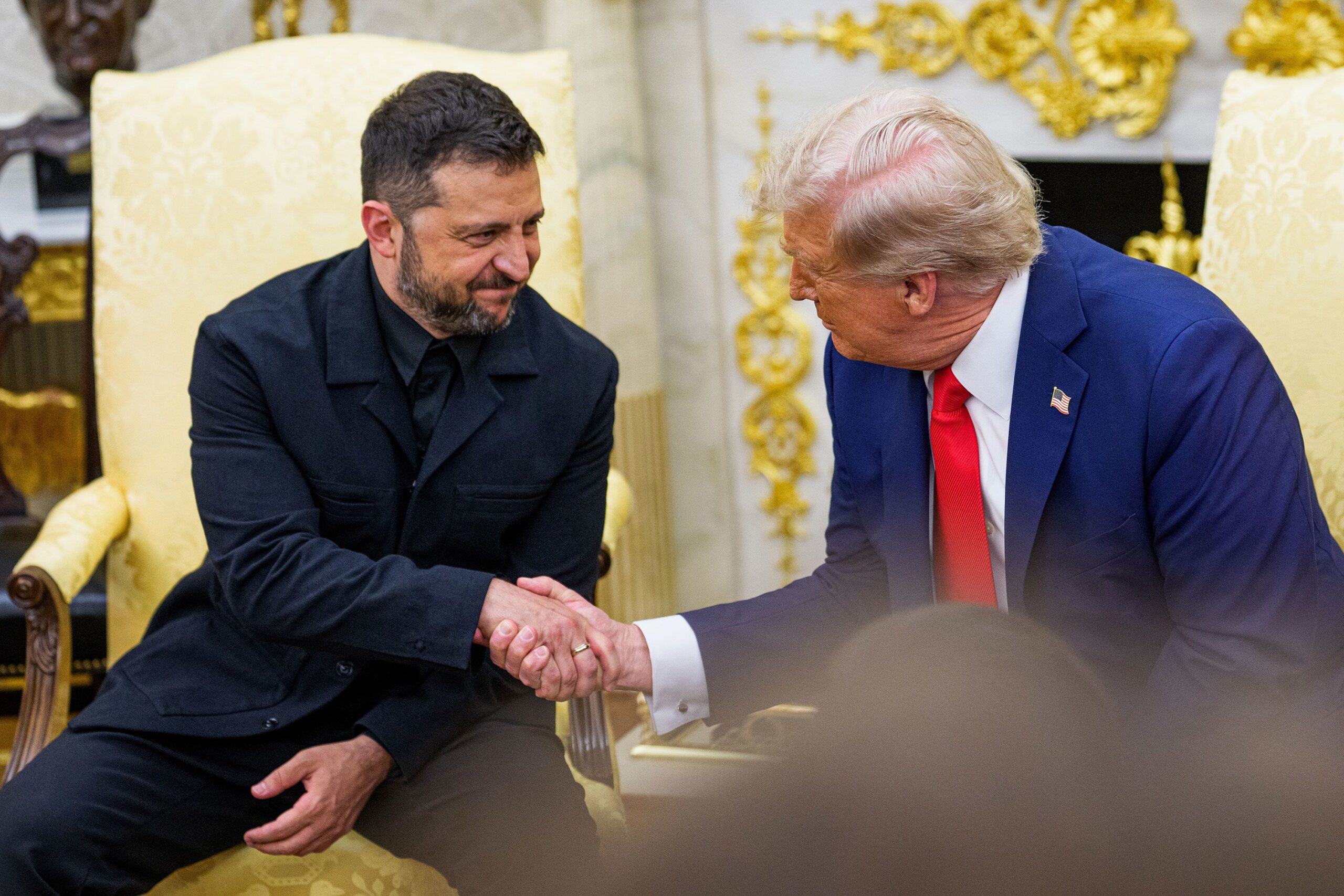 <i>Andrew Harnik/Getty Images via CNN Newsource</i><br/>President Trump greets President Putin as he arrives at Joint Base Elmendorf-Richardson in Anchorage