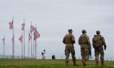 Members of the National Guard patrol on the National Mall in Washington
