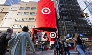 People walk in front of the Target Store in Times Square on May 15 in New York City. Target CEO Brian Cornell is stepping down after 11 years amid struggles at one of America’s most prominent retail chains.