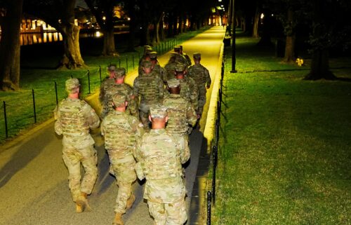 Members of the National Guard patrol the National Mall