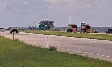 A 2022 Ford Transit was traveling in the right lane of eastbound I-70 when its rear tire blew. The vehicle lost control