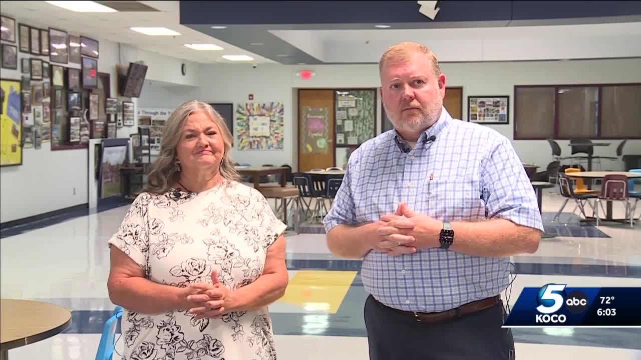 <i>KOCO via CNN Newsource</i><br/>Board members Becky Carson and Ryan Deatherage
