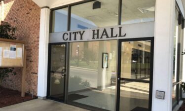 Mayor Nick Cox admitted to state auditors the city of Minden may have violated state law when it issued payments to a Texas couple in June.