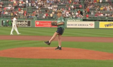 11-year-old Max Acuto throws out the first pitch at Fenway Park.