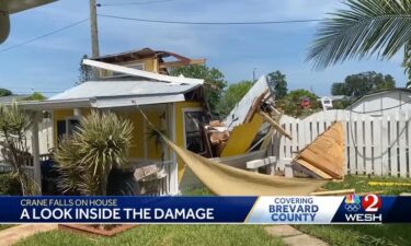 It was a chaotic scene in a normally quiet neighborhood Wednesday after a crane truck tipped over