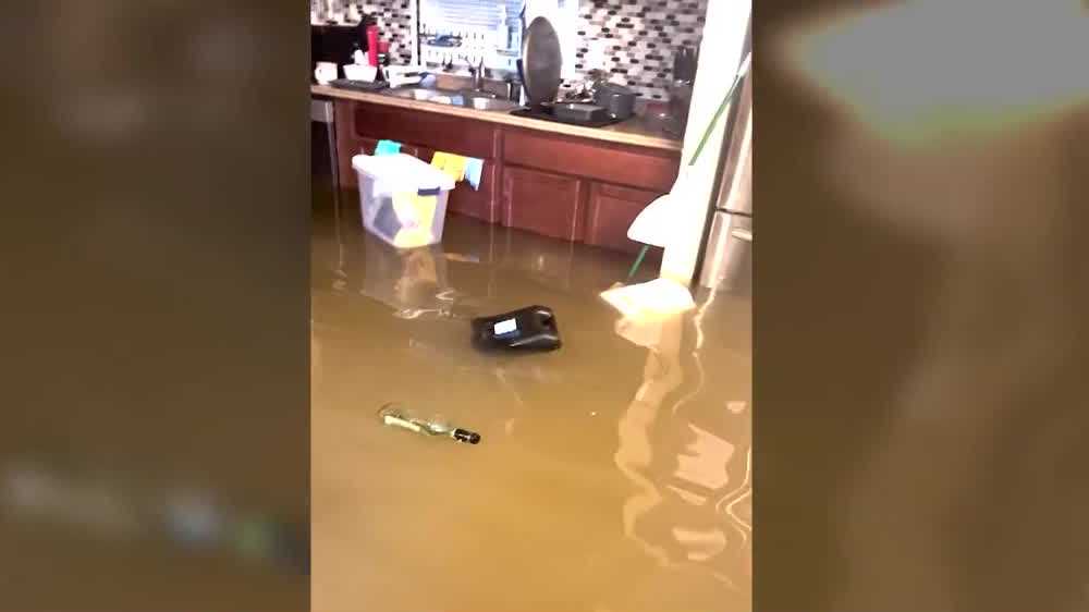 <i>WISN via CNN Newsource</i><br/>Residents watch helplessly as floodwaters inundate homes and vehicles in deluge that overwhelmed recent flood control improvements.