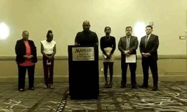 Joseph Joines speaks during a press conference held by Matheson & Associates