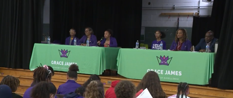 <i>WLKY via CNN Newsource</i><br/>A purple lab coat is a symbol for the students at Grace M. James Academy