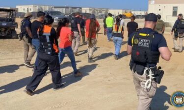 Law enforcement conduct a major immigration operation at the construction site of a Hyundai battery plant in Georgia Thursday