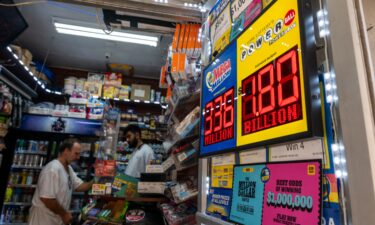 A newsstand in Manhattan advertises the latest Powerball Jackpot of $1.8 billion on September 5.