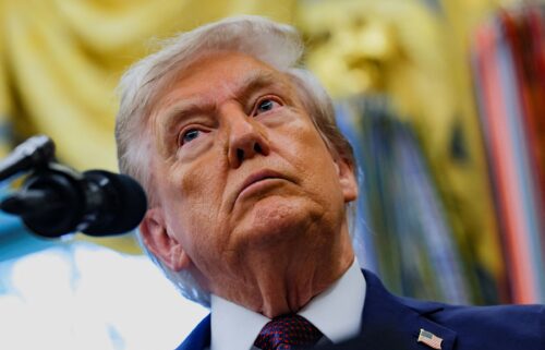 President Donald Trump looks on during an event in the Oval Office at the White House on September 2.