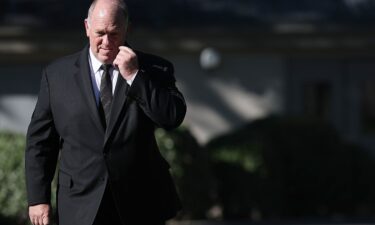 White House "Border Czar" Tom Homan walks toward reporters before answering questions outside the White House on September 8