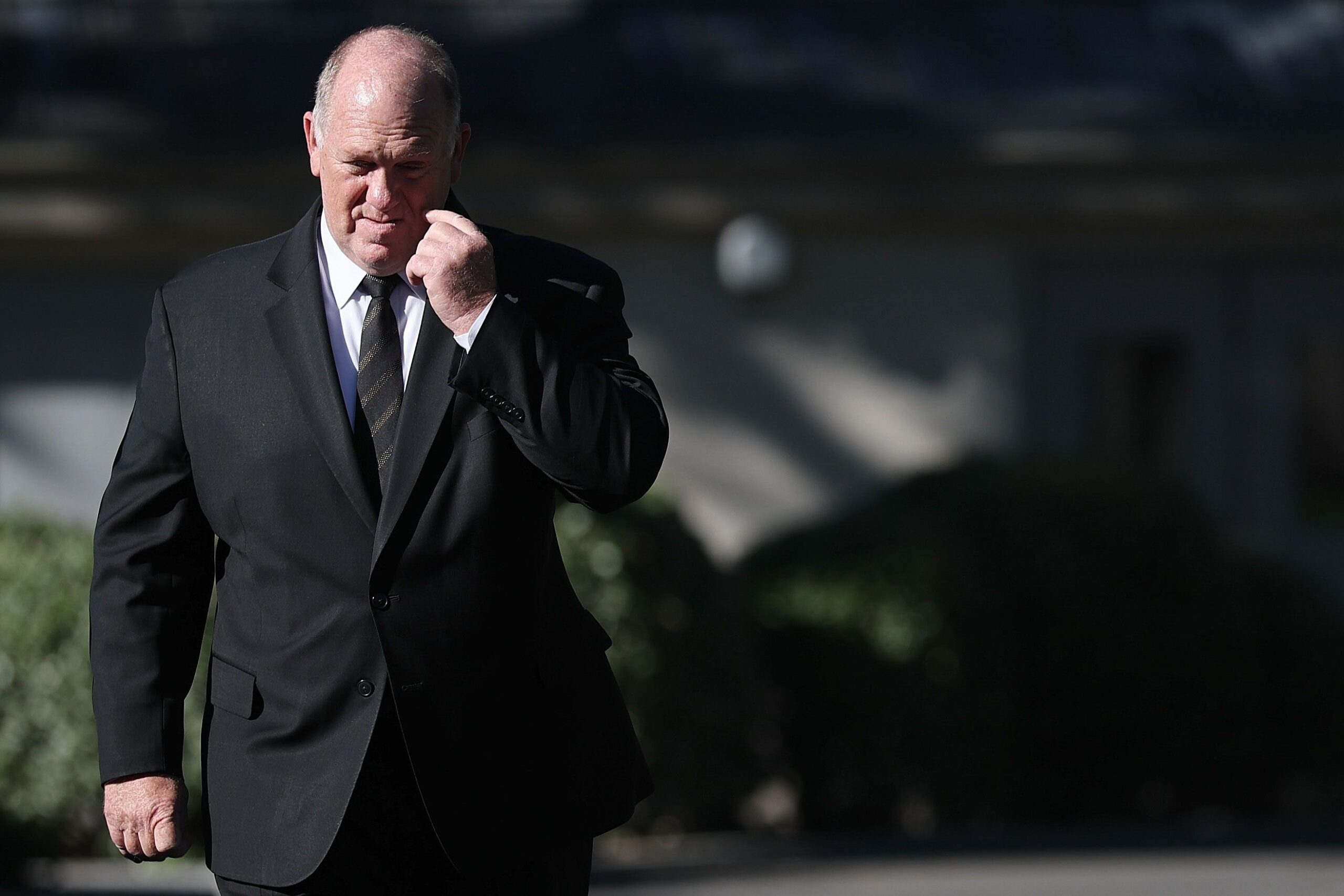 White House "Border Czar" Tom Homan walks toward reporters before answering questions outside the White House on September 8