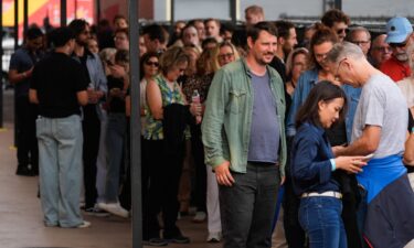 Audience members wait in line to enter the Jimmy Kimmel Live studio in Los Angeles