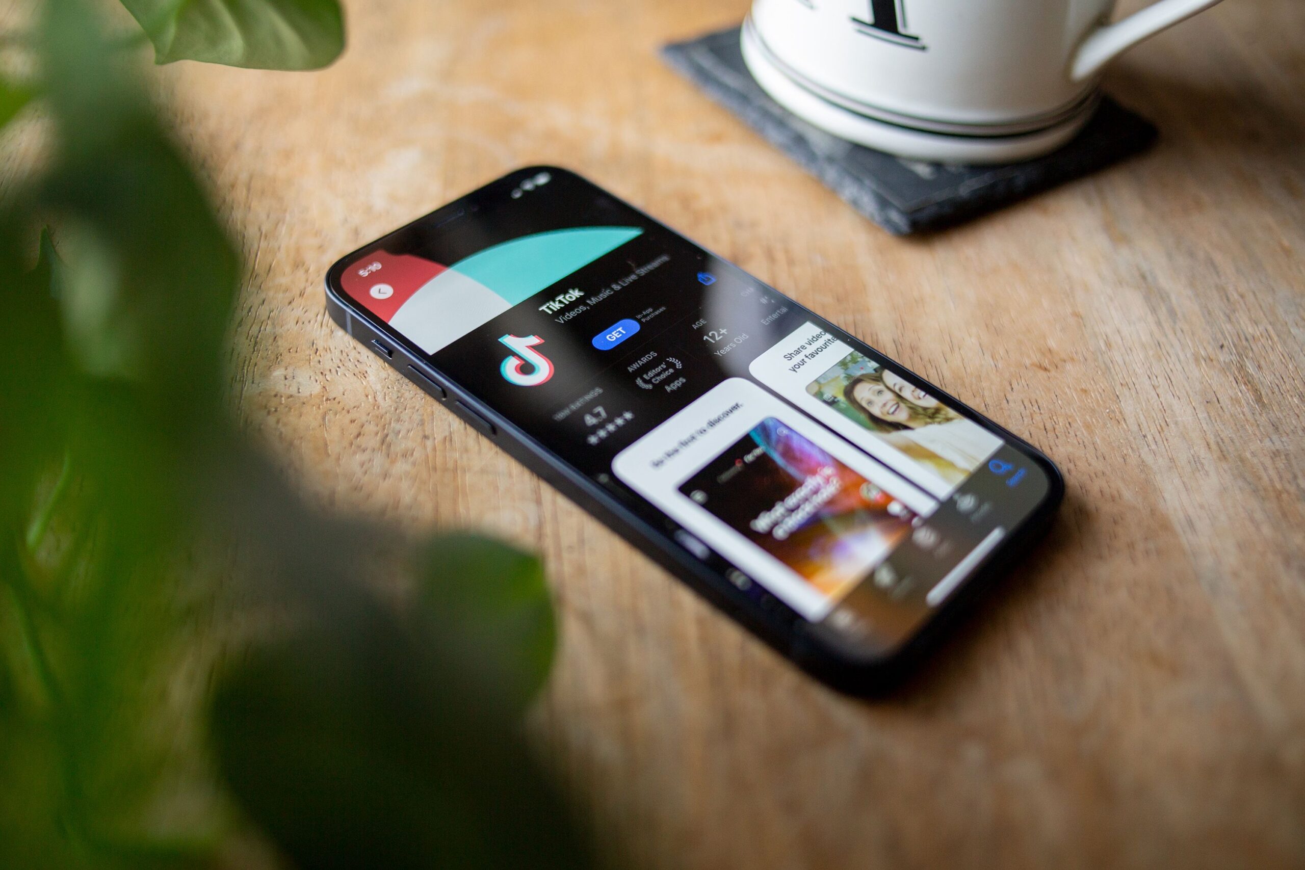 TikTok is seen in the app store of an iPhone on January 8. President Donald Trump is expected to sign an executive order on September 25 that will clear the way for the completion of a deal to sell TikTok’s US assets to a consortium of American investors