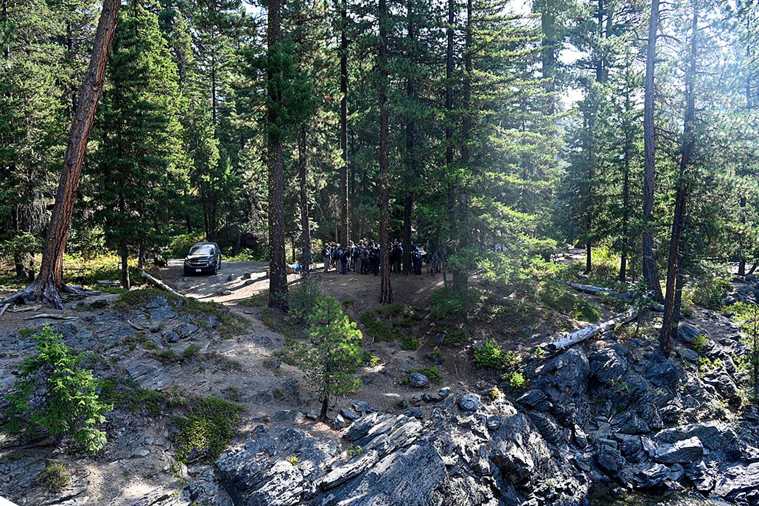 This photo provided by FBI Seattle shows several law enforcement agencies participating in the search for Travis Decker.