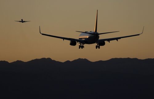 Planes land and take off in this file photo from 2022.