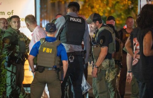FBI and Border Patrol officers arrest a man