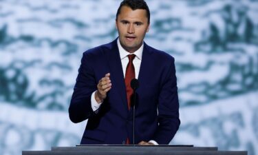 CEO of Turning Point USA Charlie Kirk speaks on stage during the first day of the Republican National Convention in Milwaukee