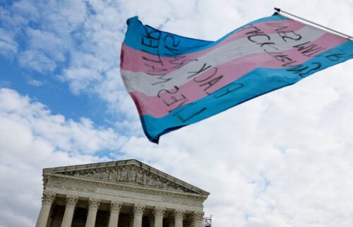 A transgender flag waves outside the US Supreme Court in Washington