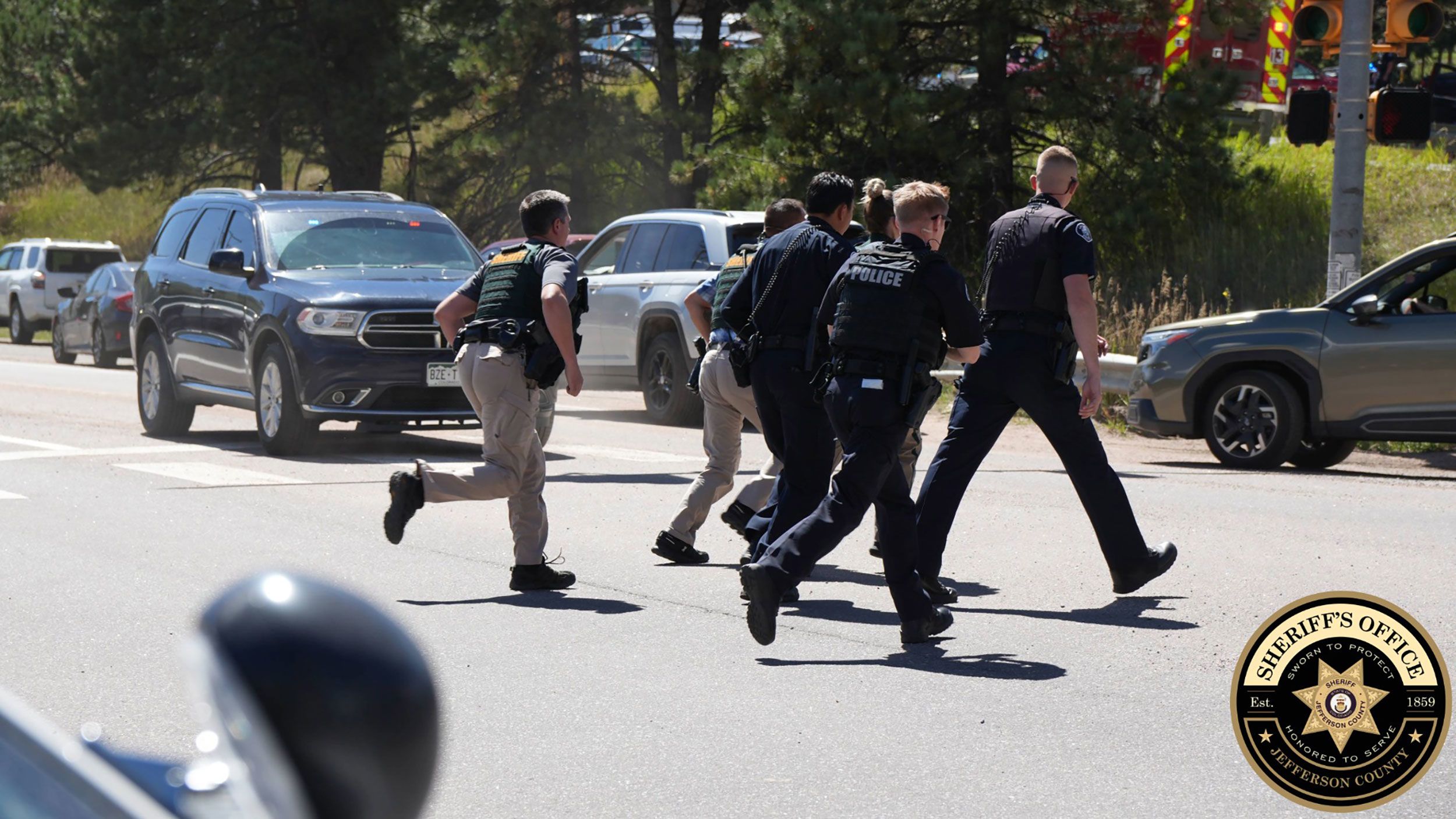 Police respond to a shooting at Evergreen High School in Evergreen