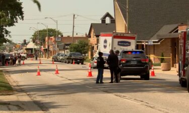 Police work a scene where a person was fatally shot and an officer was injured during a traffic stop in Franklin Park