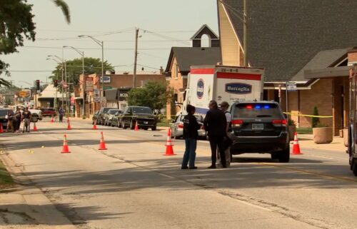 Police work a scene where a person was fatally shot and an officer was injured during a traffic stop in Franklin Park