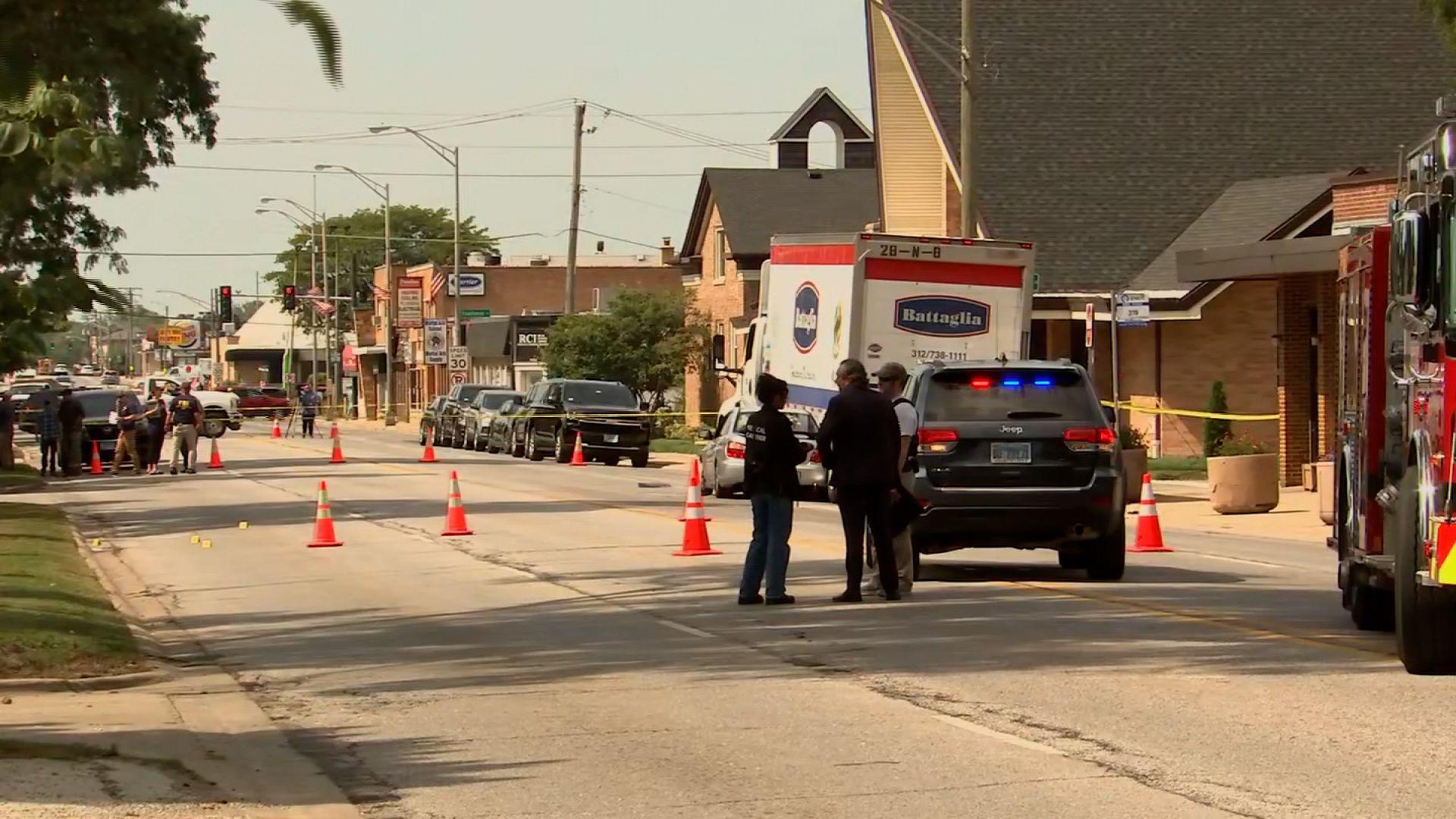 Police work a scene where a person was fatally shot and an officer was injured during a traffic stop in Franklin Park
