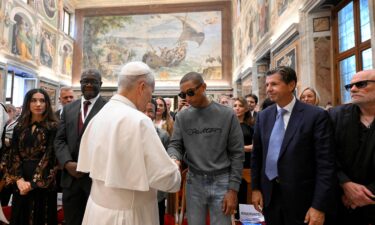 Pope Leo XIV poses with participants in the third edition of the World Meeting on Human Fraternity on September 12