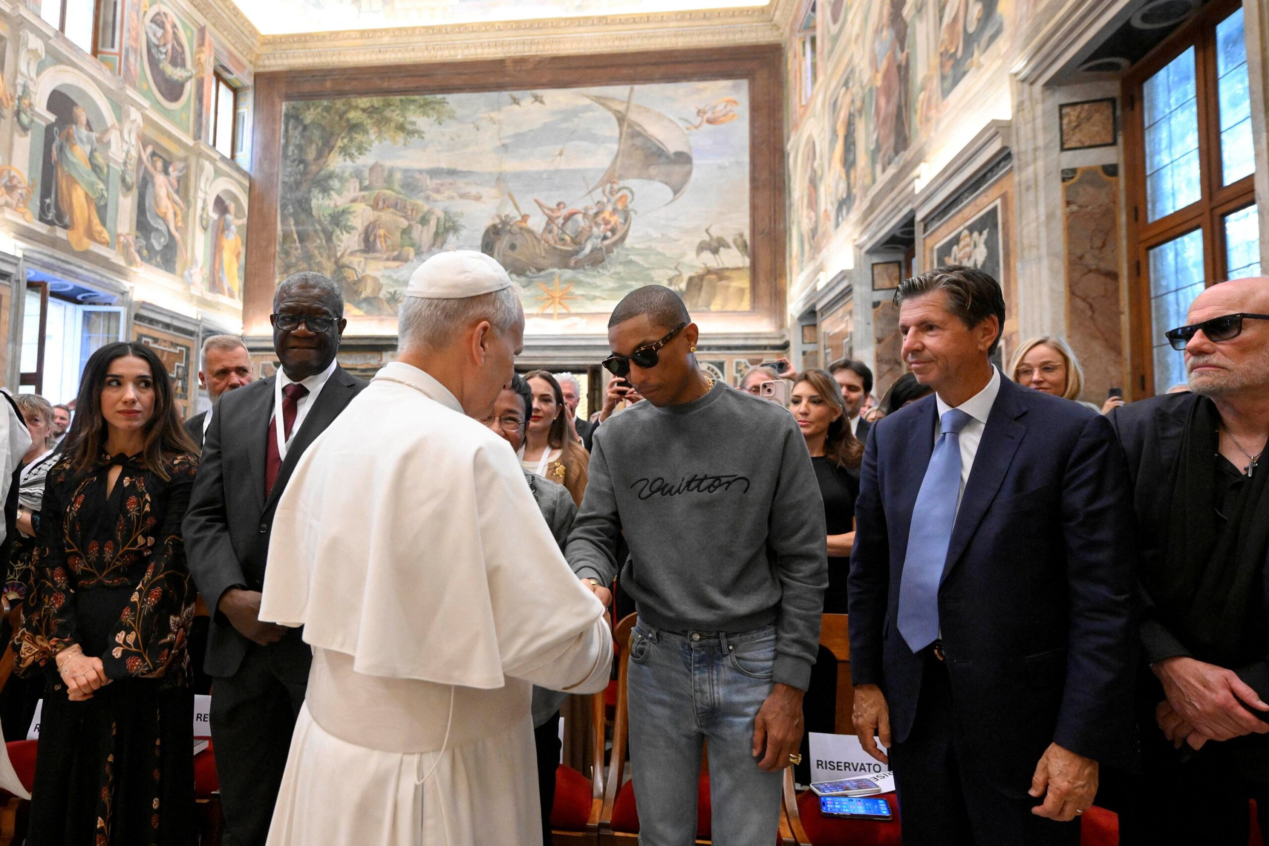 Pope Leo XIV poses with participants in the third edition of the World Meeting on Human Fraternity on September 12