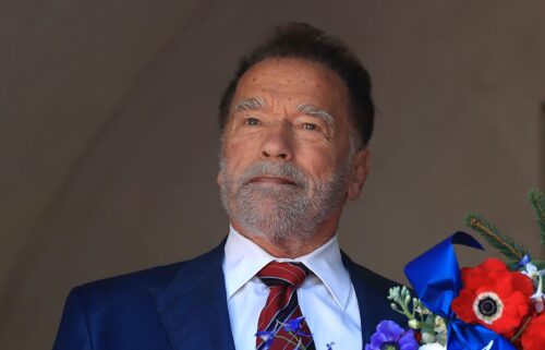 Former California Gov. Arnold Schwarzenegger lays a wreath at George Washington's tomb during An American Celebration 2025 in Mount Vernon