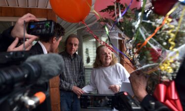 Jo-Ann Snyder and her husband Michael open the door for Publishers Clearing House at her home in Wilkes-Barre Township in 2018. Winners who had been promised lifetime prizes are losing those payments due to Publishers Clearing House's bankruptcy.