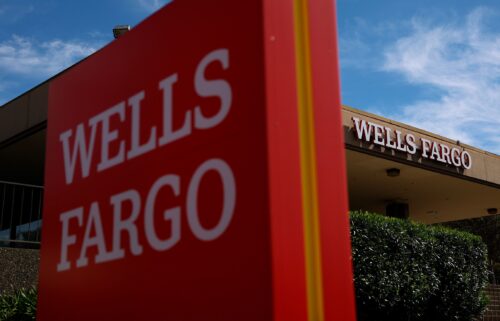 A sign is posted in front of a Wells Fargo bank office in San Rafael