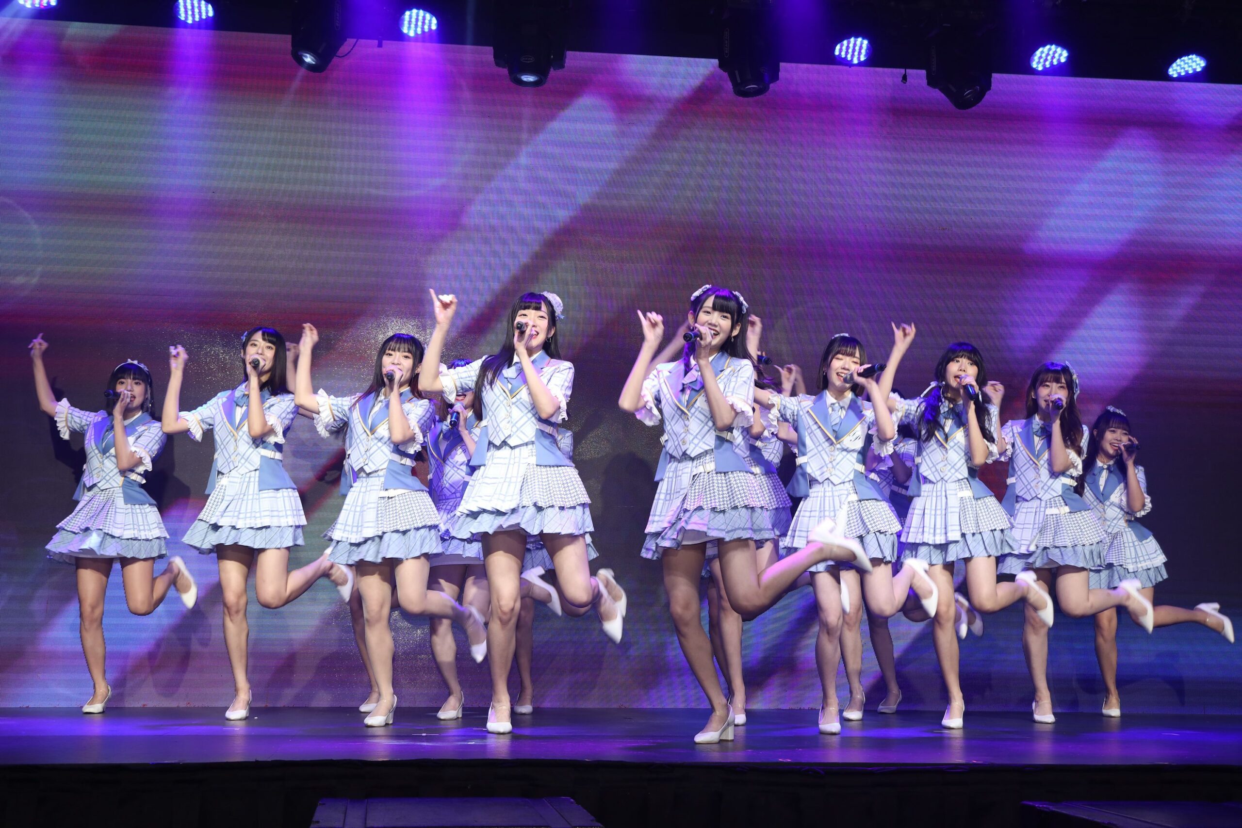 <i>Chen Lihong/VCG/Getty Images via CNN Newsource</i><br/>Members of AKB48 are pictured on stage in 2021.