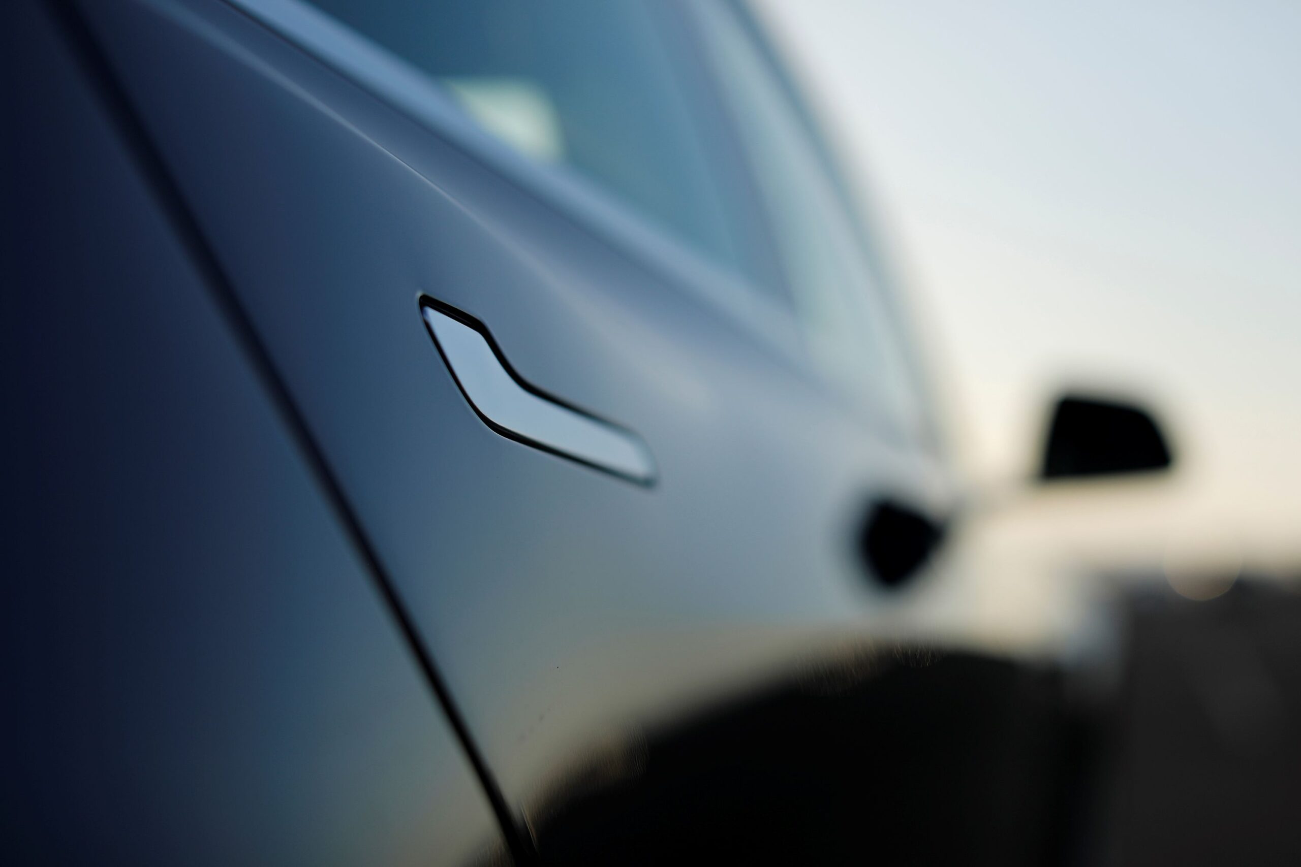<i>Mike Blake/Reuters via CNN Newsource</i><br/>The door handle on a 2018 Tesla Model 3 electric vehicle. Problems with the door handle have reportedly trapped passengers in Tesla vehicles in some instances.